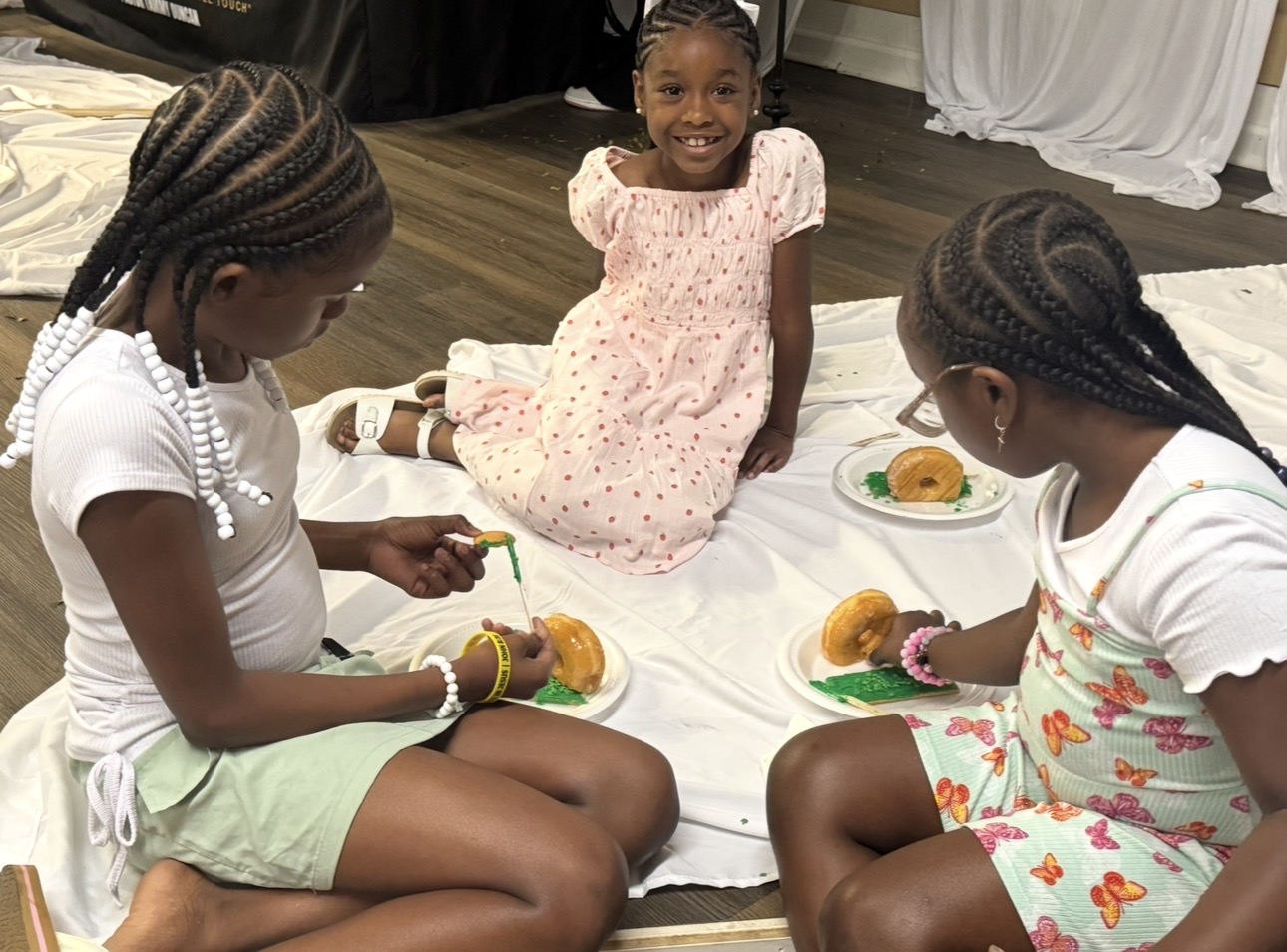Children enjoying food and fellowship at a ministry event