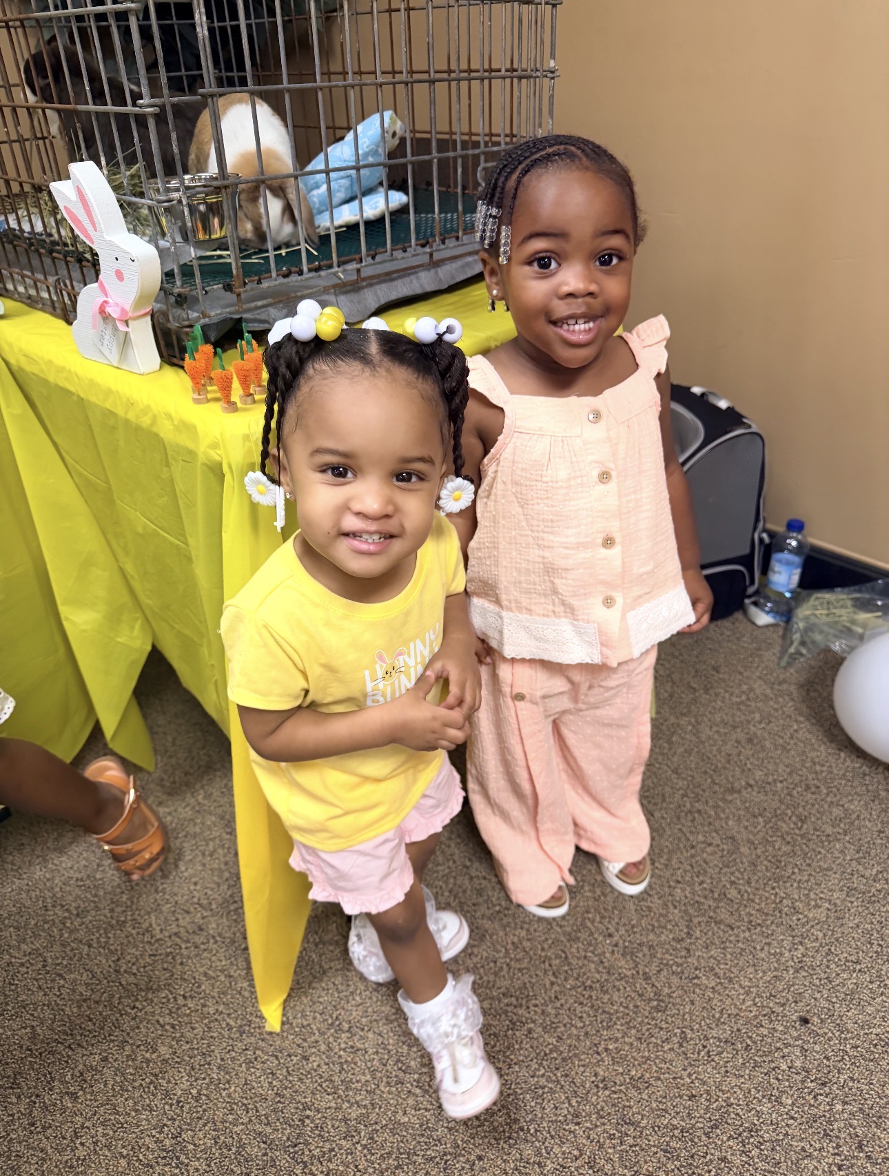 Two children smiling at a family ministry event