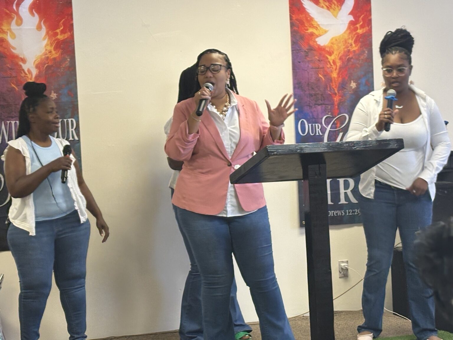 Worship team singing together during service